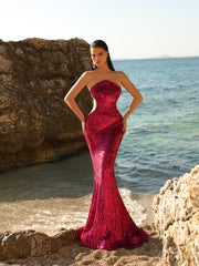 hot pink sequin dress featuring a mermaid shape