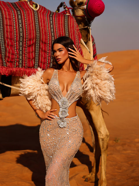 nude evening gown with a feathery boa