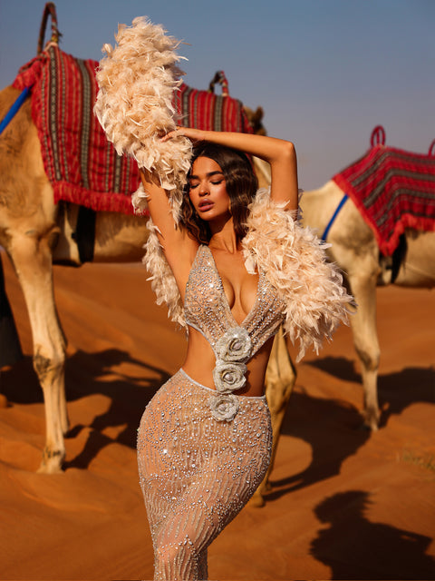 nude evening gown with a feathery boa