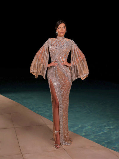 nude evening gown featuring a side slit