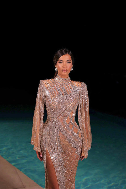 nude evening gown featuring a side slit