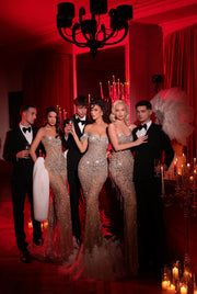 nude evening gowns featuring crystals, fur and feathers