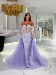 purple dress featuring opera gloves and a detachable train