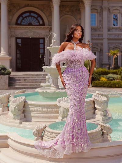 purple evening gown featuring feather details