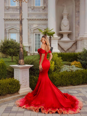 red evening dress featuring feathers