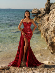 red sequin dress featuring a side slit