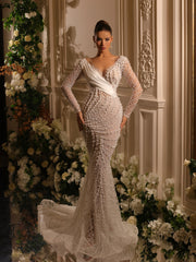 bridal gown featuring a long train