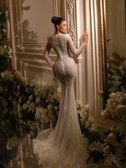bridal gown featuring a long train
