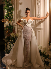 bridal gown featuring a removable tail