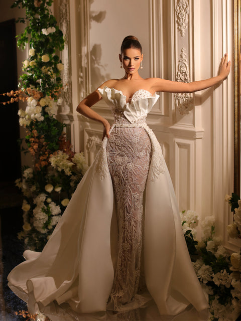 bridal gown featuring a removable tail
