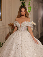 bridal ball gown featuring an off-shoulder neckline