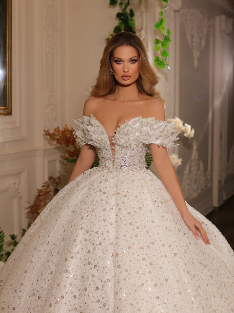 bridal ball gown featuring an off-shoulder neckline