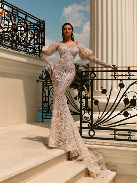 nude dress featuring a long tail